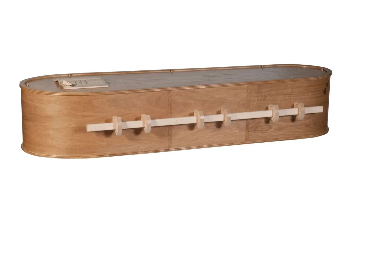 The Old English Oak modern coffin supplied by Brunskill Family Funerals